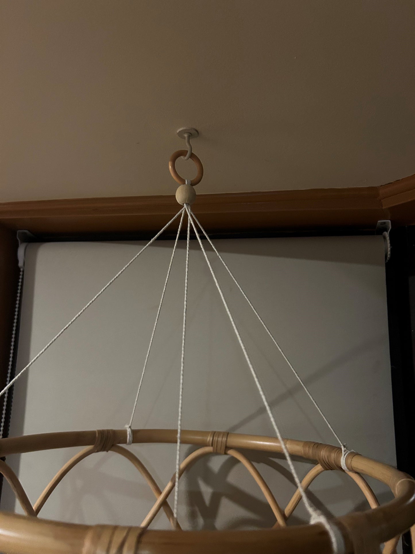 The rattan is drawn together with a strong cotton string and finished with a wooden bead and wooden ring to link onto a hook