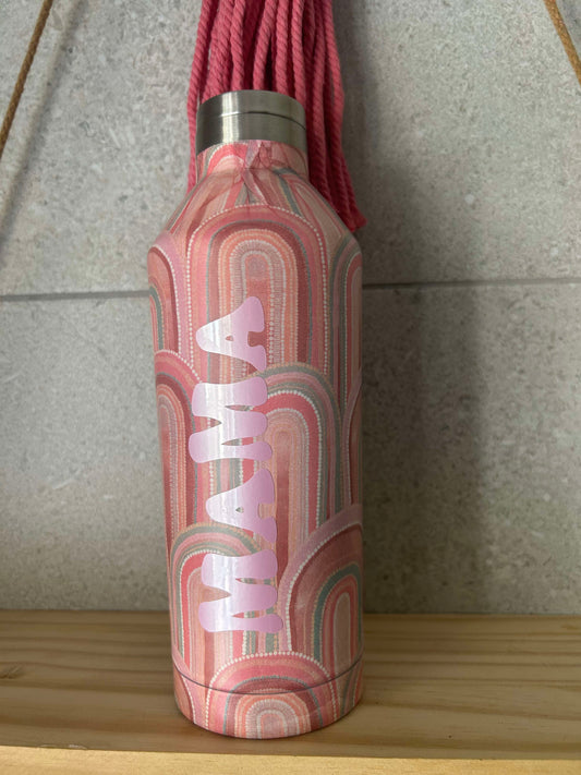 A pink water bottle with 'MAMA' printed on the side, featuring a desert daisies pattern