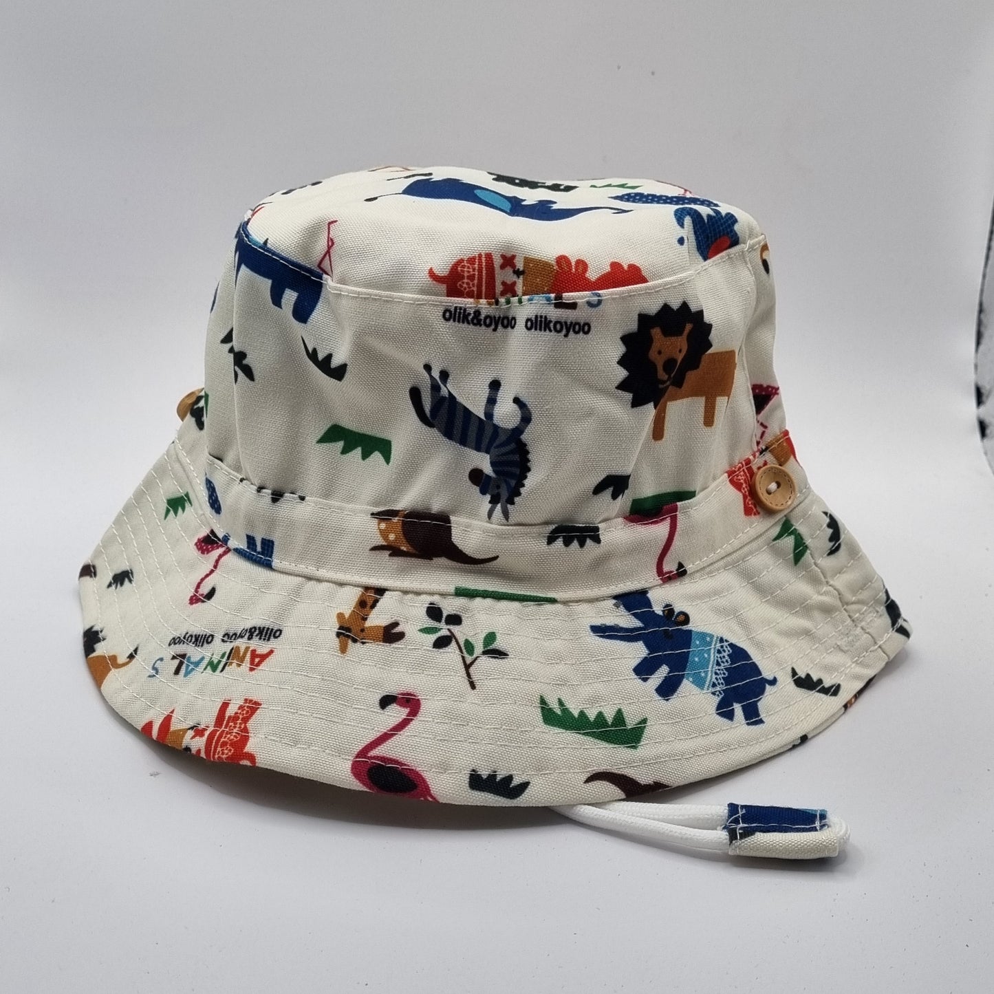 Children's hat with animal pattern on a white background.