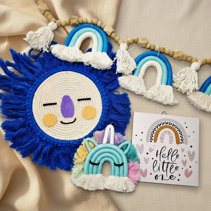 Boho baby boy gift set flat lay - blue macrame lion wall hanging, rainbow garland, teal unicorn keychain and Hello Little One plaque - handmade nursery gift Australia