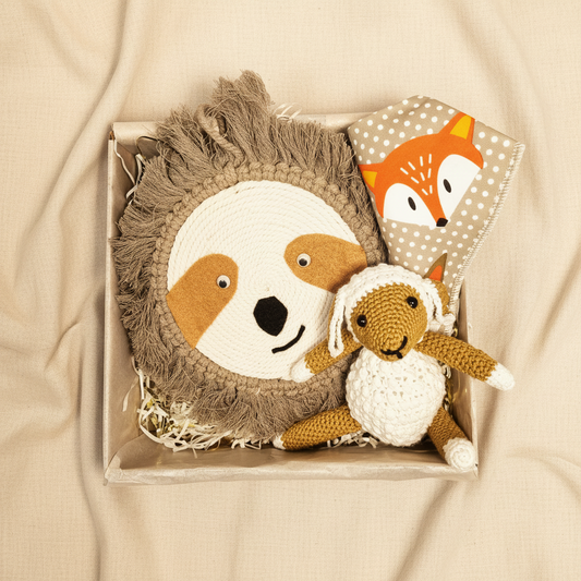 Oliver Baby Boy Gift Box open showing macrame sloth wall hanging, crochet lamb soft toy and fox bandana bib - handmade baby boy gift Australia