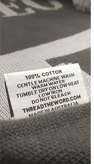 Care label showing 100% cotton, made in Australia, gentle machine wash